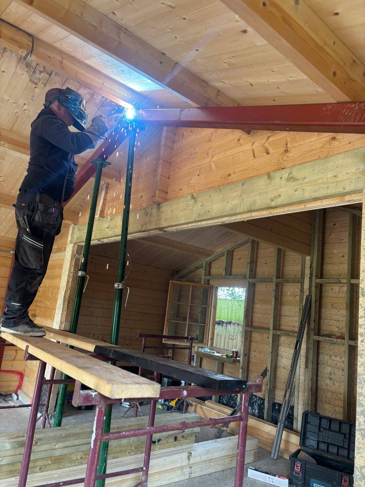Grandform garden room project with large glazing and timber-style exterior finish